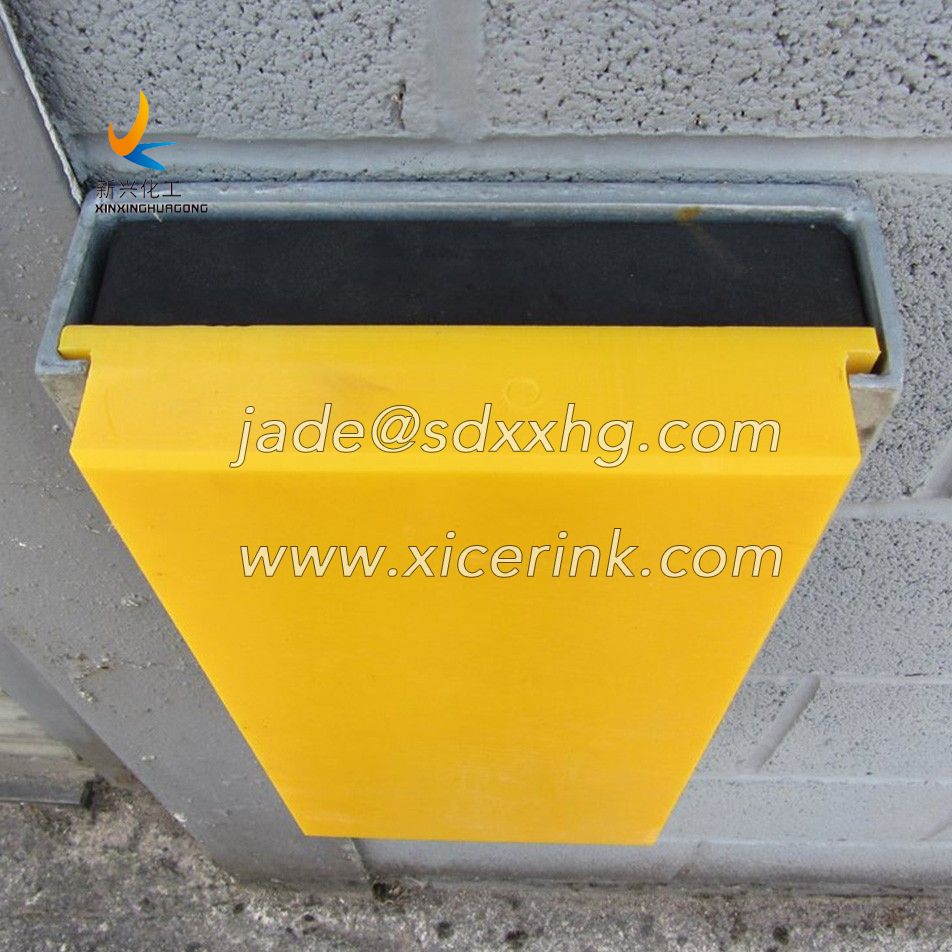 sliding dock bumper with UHMWPE block